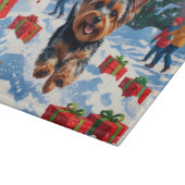 Yorkshire Terrier in de sneeuw met kerstmuts Snijplank (Hoek)