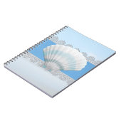 Zacht blauw naadschild en kant notitieboek (Linkerzijde)