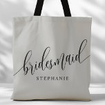 Zacht Grijs Bruidsmeisje Modern Script Tote Bag<br><div class="desc">Show uw waardering voor uw bruidsfeestje met deze stijlvolle zacht grijze bruidsmeisje canvas tas. Met modern script en aanpasbaar met de naam van uw bruidsmeisje, deze canvas tas is zowel praktisch als elegant. De zachte kleur en het chique ontwerp maken het perfect voor het dragen van bruiloft dag benodigdheden of...</div>