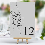 Zacht Grijs Moderne Kalligrafie Bruiloft Kaart<br><div class="desc">Leid uw gasten naar hun stoelen met deze chique elegante zachte grijze trouwtafelnummers. Met een minimalistisch ontwerp met moderne kalligrafie, voegen deze tafelnummers een vleugje verfijning toe aan uw huwelijksreceptie. De zachte achtergrond en de schone, elegante typografie zorgen voor eenvoudige leesbaarheid en verbeteren tegelijkertijd uw bruiloft decor. Perfect voor elk...</div>