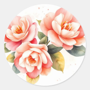 Zacht roze en perzik camelia's op ivoor ronde sticker