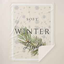 Zacht winterlicht met dennentak en sneeuw sherpa deken