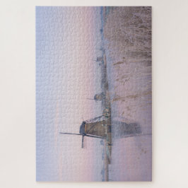 Zacht zonlicht in de winter boven windmolens legpuzzel