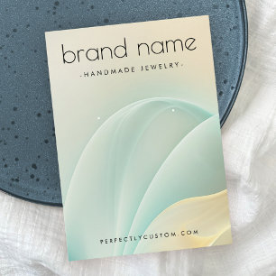 Zachte aqua en gouden zwanen die een beeldschermka visitekaartje