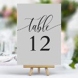 Zachte Grijze Minimalistische Kalligrafie Bruiloft Kaart<br><div class="desc">Leid uw gasten naar hun stoelen met deze elegante zachtgrijze trouwtafelnummers. Met een minimalistisch ontwerp met moderne kalligrafie, voegen deze tafelnummers een vleugje verfijning toe aan uw huwelijksreceptie. De zachte achtergrond en de schone, elegante typografie zorgen voor eenvoudige leesbaarheid en verbeteren tegelijkertijd uw bruiloft decor. Perfect voor elk trouwthema, deze...</div>