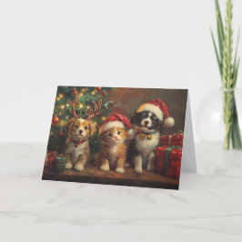 Zachte honden en katten onder de kerstboom feestdagen kaart
