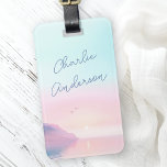 Zachte pastel zonsopgang met vogels scriptnaam bagagelabel<br><div class="desc">Bagagelabel met jouw naam in een handgeschreven stijl script over een zachte,  pastelkleurige zonsopgang met een klif en twee vogeltjes aan de voorkant. Voeg uw contactgegevens op de achterkant toe.</div>