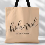 Zachte perzik bruidsmeisje modern script tote bag<br><div class="desc">Show uw waardering voor uw bruidsfeest met deze stijlvolle zacht perzik bruidsmeisje canvas tas. Met modern script en aanpasbaar met de naam van uw bruidsmeisje, deze canvas tas is zowel praktisch als elegant. De zachte kleur en het chique ontwerp maken het perfect voor het dragen van bruiloft dag benodigdheden of...</div>