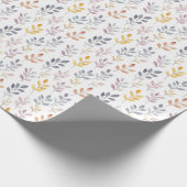 Zachte regenboogbladeren op wit cadeaupapier (Hoek)