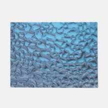 Zachte regendruppels op blauw glas