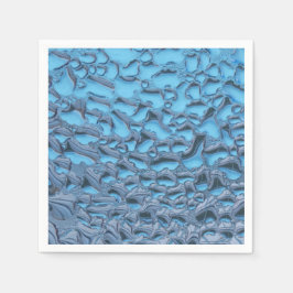 Zachte regendruppels op blauw glas servet