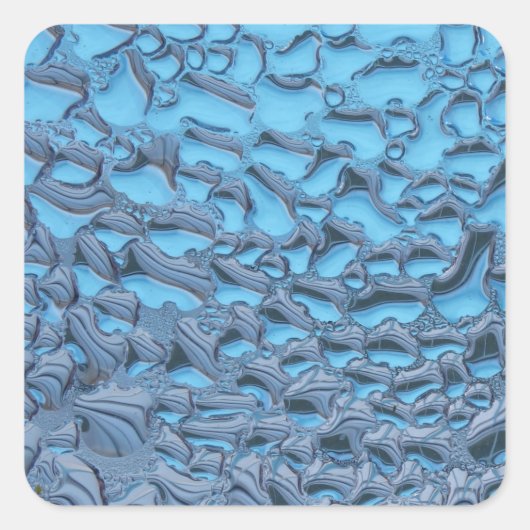 Zachte regendruppels op blauw glas vierkante sticker (Voorkant)