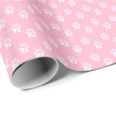 Zachte witte pootafdruk op roze cadeaupapier (Rol Hoek)