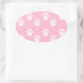 Zachte witte pootafdruk op roze ovale sticker (Tas)
