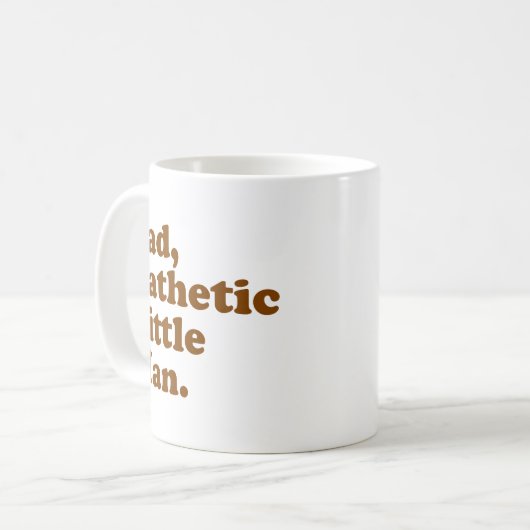 Zad, zielig klein Man. Koffiemok (Voorkant links)