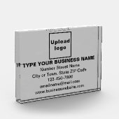 Zakelijk merk op grijs rechthoekig fotoblok (Links)