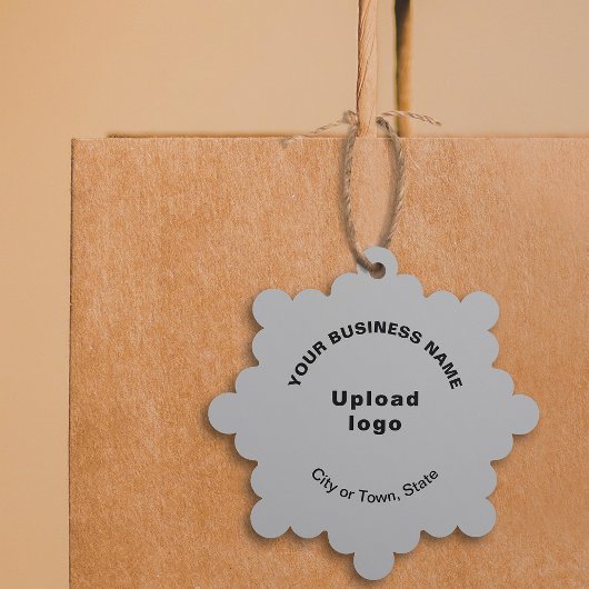 Zakelijk merk op grijs sneeuwvlokvormpapier ornament kaart