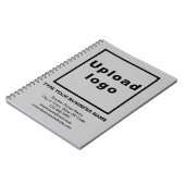 Zakelijk merk op grijze notitieboek (Linkerzijde)