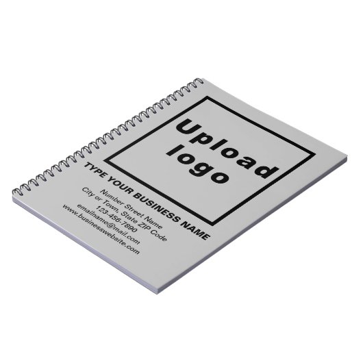 Zakelijk merk op grijze notitieboek (Linkerzijde)