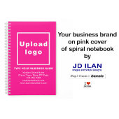 Zakelijk merk op roze spiraalvormig Notitieboek