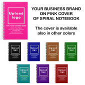 Zakelijk merk op roze spiraalvormig Notitieboek