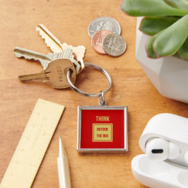 Zakelijke prijsopgave denkt buiten het vak rood sleutelhanger