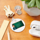 Zakenman presenteert Sleutelhanger