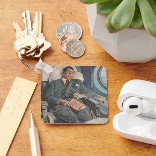 zakenreizen, lezen op het vliegtuig sleutelhanger (Bureau)