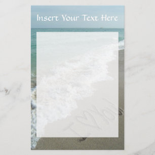 Zand schrijft op de beach, ik hou van je briefpapier