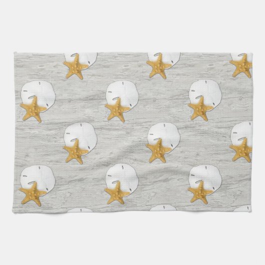 Zanddollar en zeeduivel op handdoeken (Horizontaal)