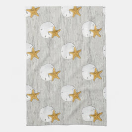 Zanddollar en zeeduivel op handdoeken