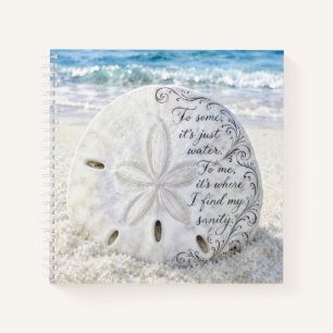 Zanddollar met inspirerende quote notitieboek