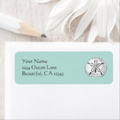  zanddollar op Aqua Seashell Beach-adres Etiket (Insitu)