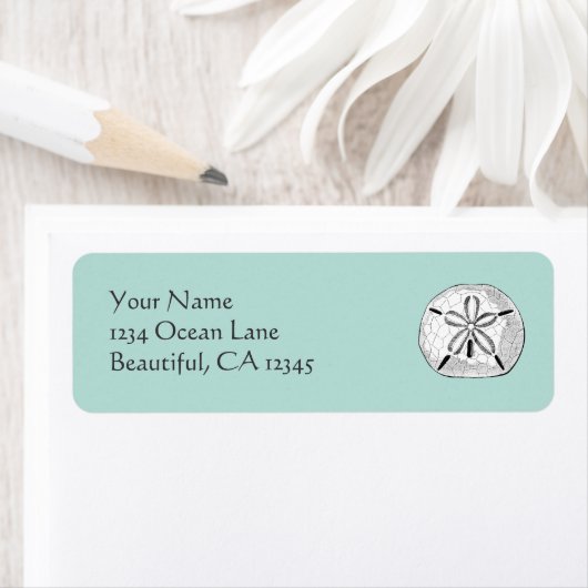  zanddollar op Aqua Seashell Beach-adres Etiket (Insitu)
