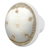 Zandendollar op een goudzand op de zee keramische knop (Rechts)