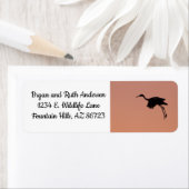 Zandheuvel silhouet tegen een roze zonsondergangsl etiket (Insitu)