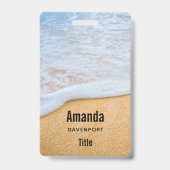 Zandstrand met schuimende branding badge (Achterkant)