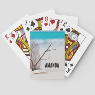 Zandstrand met witte schelpen pokerkaarten