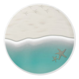 Zandstrand zee water met zeestervis keramische knop