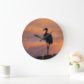 Zandtapkraansilhouet op zonsondergang grote klok (Huis)