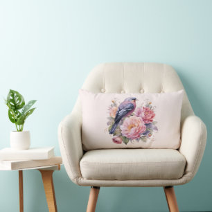 Zangvogel zit bovenop roze pioenrozen kussen