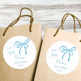 Ze bindt de knoop blauwe lintboog gunst ronde sticker