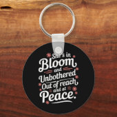 Ze is in bloei en ongestoord buiten bereik en op sleutelhanger (Voorkant)