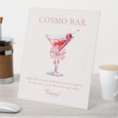 Ze maakt de knoop roze Coquette Cosmo Bar Reclamebord Met Voetstuk (Insitu)
