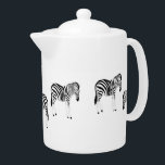 Zebra-dierpatroon op wit theepot<br><div class="desc">Zebra dier met zwarte en witte strepen op een wit achtergrondpatroon.</div>