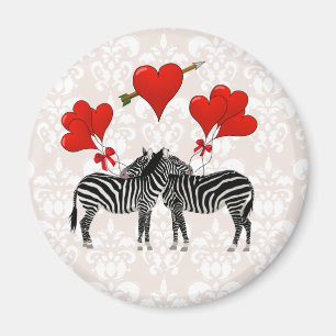 Zebras en harten in roze vocht magneet
