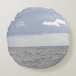 Zee en  wolken rond kussen