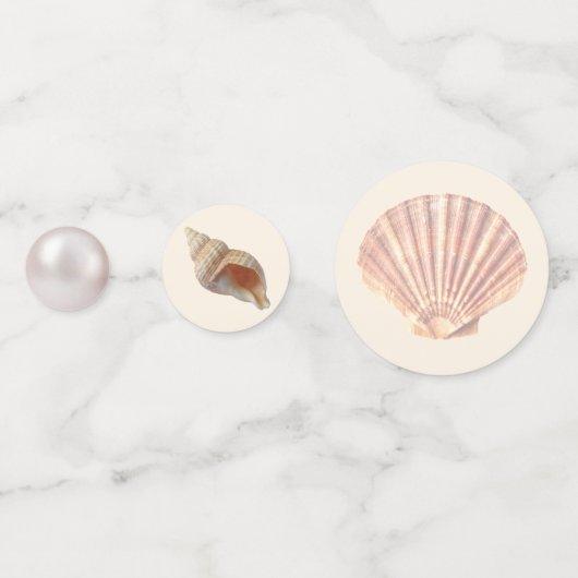 Zee oesterschalen, sterren en parels op ivoortafel confetti (Voorkanten)