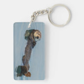 Zee otter die op de rug drijft sleutelhanger (achterkant)