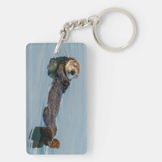 Zee otter die op de rug drijft sleutelhanger (achterkant)